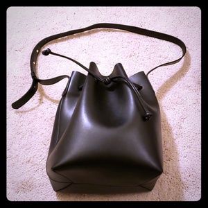 Black and red leather bucket bag